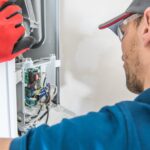 technician doing a furnace maintenance service