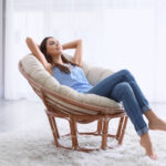 woman sitting in clean room