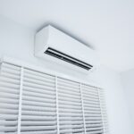ductless mini split mounted to a wall