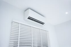 ductless mini split mounted to a wall