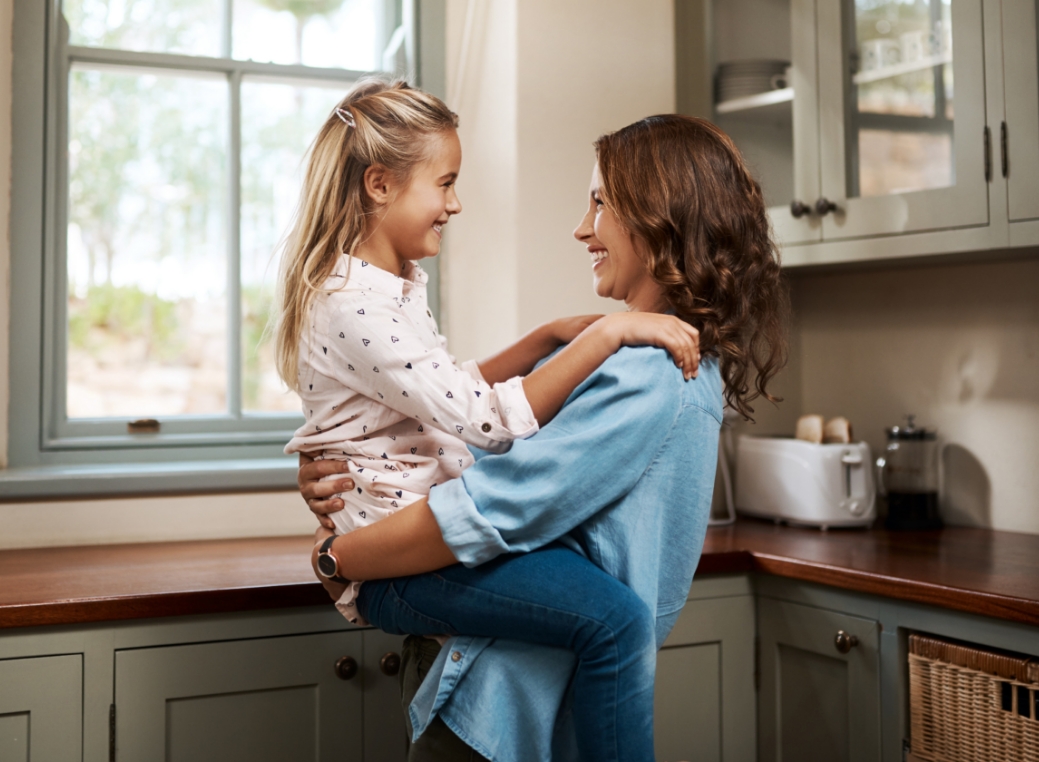 Mother and daughter is happy while waiting for Polybutylene Pipe Replacement
