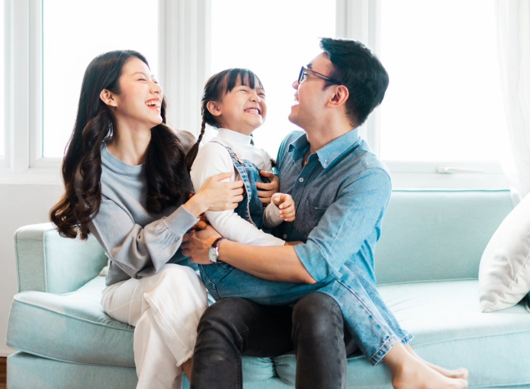 A happy family waiting for Heat Pump Installation in Huntertown, IN